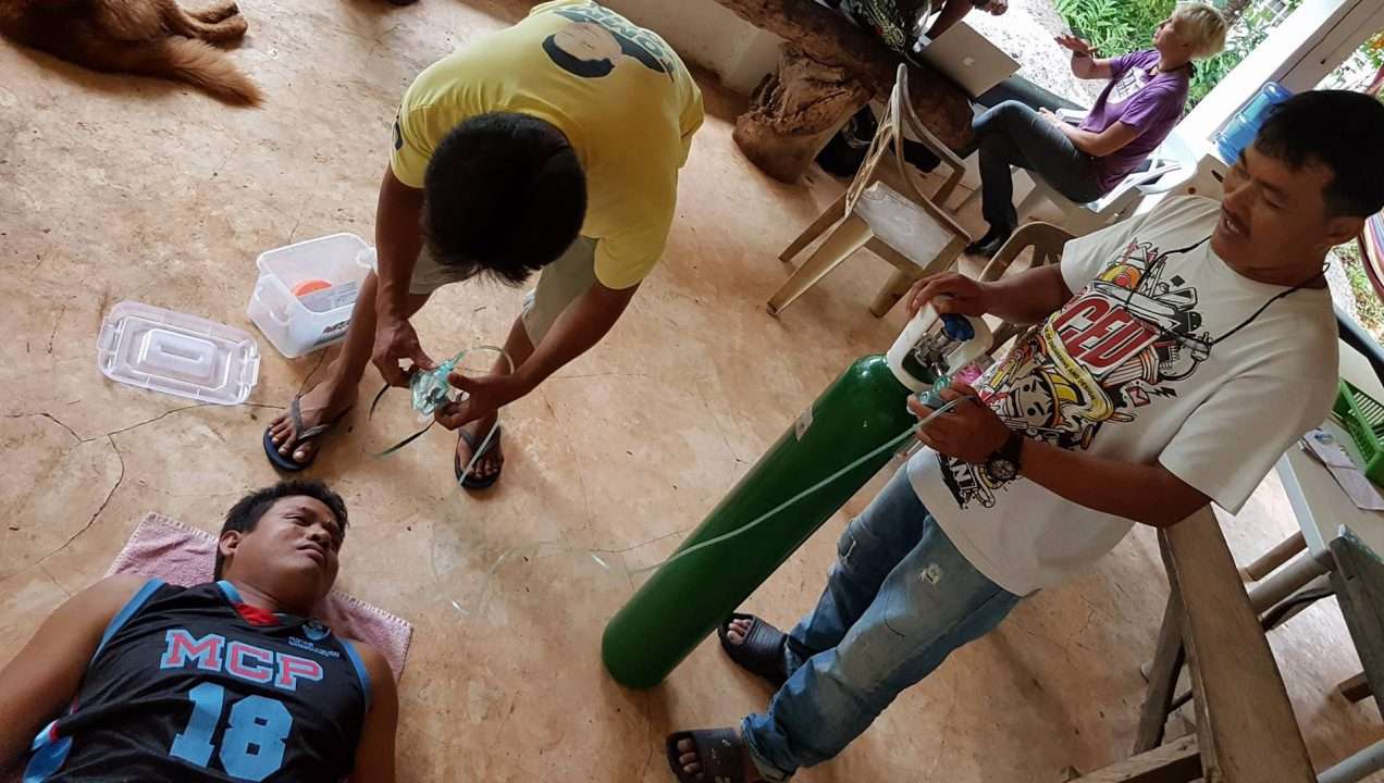 MCP staff practising emergency oxygen first aid on a colleague