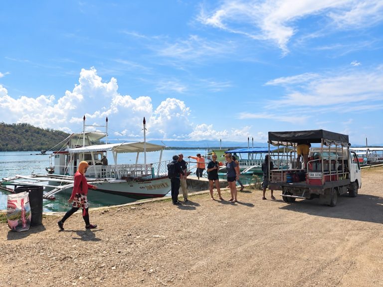 Heading out to train a municipal dive team from the pier in Bais City