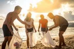 Volunteers cleaning up a beach in the Philippines