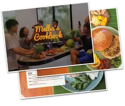 The cover of Melba's Cookbook with two recipe pages behind it