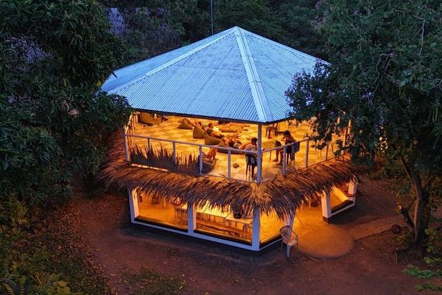 The MCP base communal area lit up at dusk